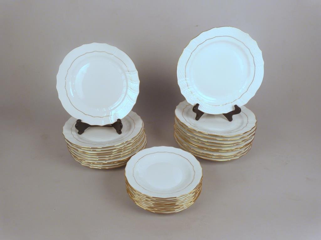 31 Piece Herend Partial Dinner Service: Porcelain, with gold trim, 10 dinner plates (one tiny rim chip), 11 salad plates (no chips), and 10 bowls (no chips).