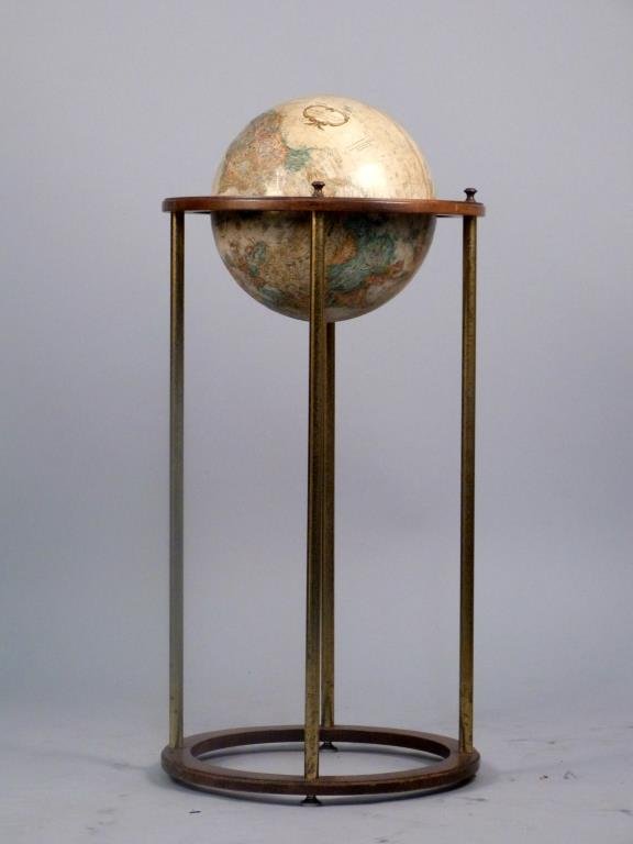 Terrestrial Globe on Stand: On wood and brass stand, 18 D x 38" H, missing one brass appointment."