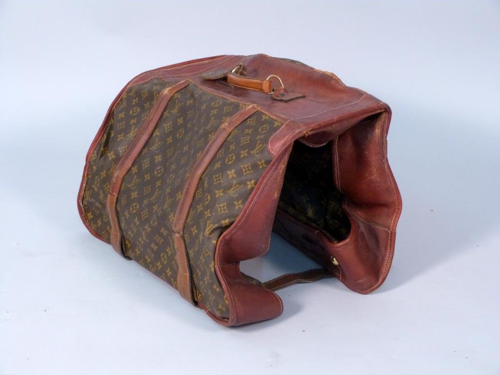 Vintage Louis Vuitton Garment Luggage Bag: Worn leather mounts. 37" x 22" x 6"