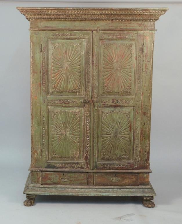 Distressed Painted Wood Indo-English Armoire: Carved mounding and carved panel doors, on paw feet, 48 1/2" W x 20" D x 67 1/2" H.