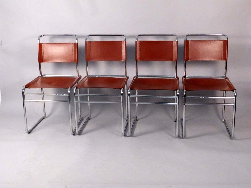 4 Mid-Century Mart Stam Style Side Chairs: Rust leather sling upholstery on chrome frames, some pitting to chrome and cracking to leather, 17 1/2 W x 25 D x 31" H (each)