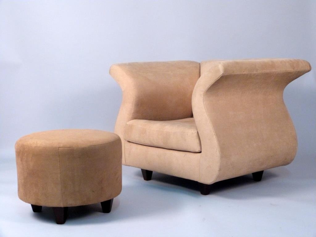 Lute Form Lounge Chair with Ottoman: On tapered block legs, sand color faux-suede upholstery, ottoman slightly darker, ottoman: 21" D x 16" H, chair: 39" W x 32" D x 29 1/2" H, minor staining.