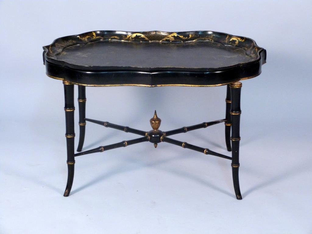 English Large Papier Mache Tray on Stand: Gilt design on scalloped tray. signed B. Walton & Co. Faux bamboo legs, X stretcher with urn finial. 32" W x 24"D x 19 1/2" H
