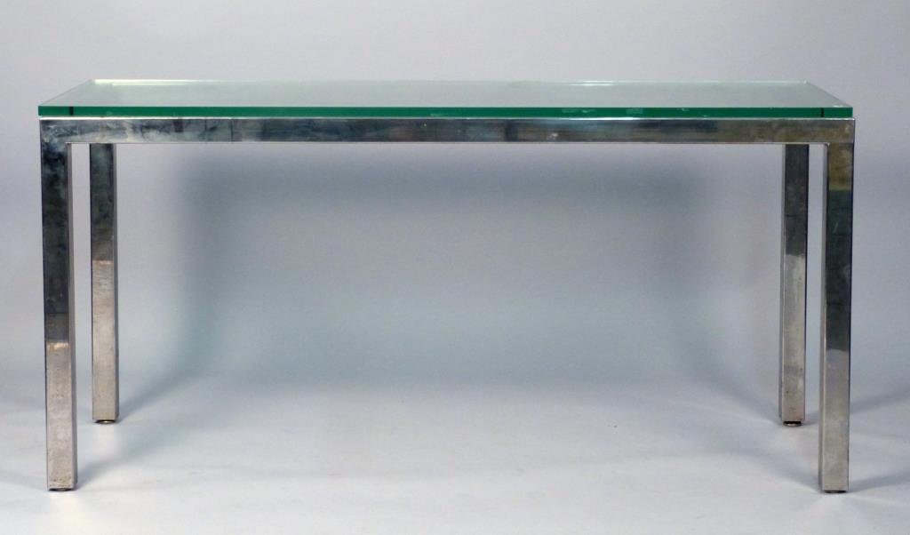 Milo Baughman Console Table: Seamless chrome frame with 1" thick glass top, 60" L x 24" D x 29" H, some light rust to frame.