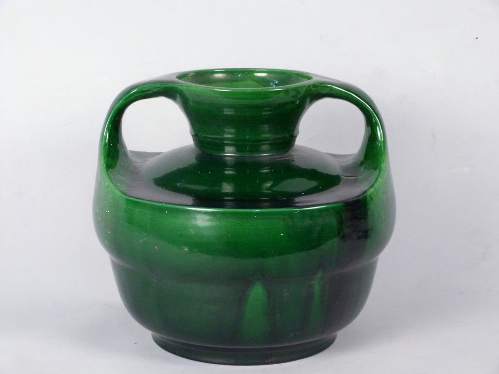 Teco Style Green Glazed Ceramic Vase: Emerald glaze, bulbous body, sloping handles, trumpet shaped neck, 11 1/2" Diameter, 11" Height, some scratching to glaze