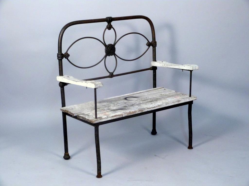 Reproduction Cast and Wrought Iron Bench: Split wood painted slats and newer screws. 38"W X 20"D X 39"H.