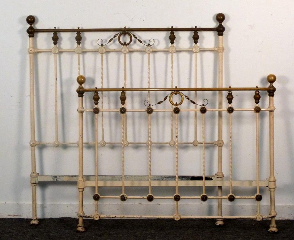 Cast Iron and Brass Bed: Straight and turned posts, headboard: 47 1/2" W x 52 1/2" H.
