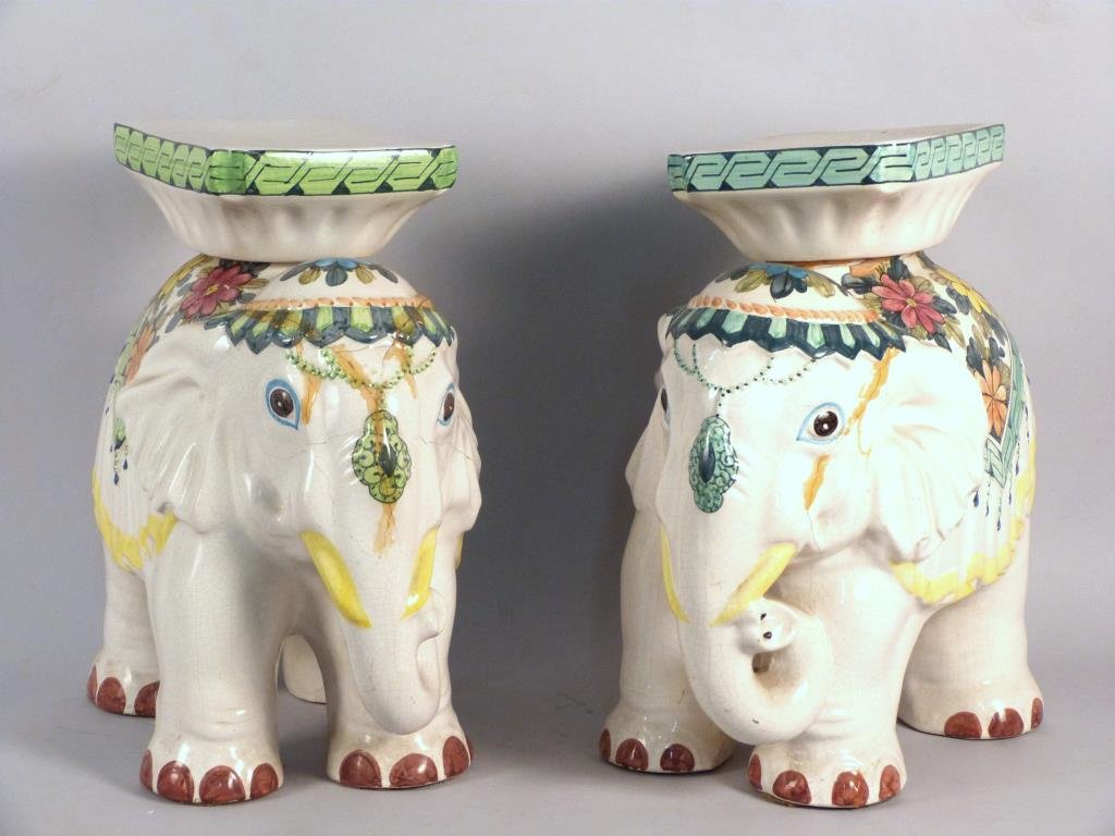 Pair of Ceramic Elephant Garden Seats (as is): White ground with floral and other decoration, 16" W x 17 1/2" H. Cracked and repaired.