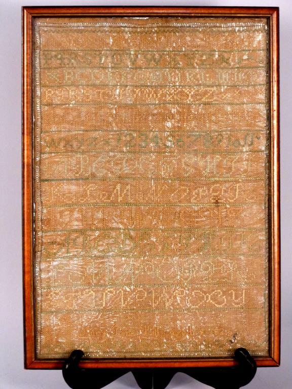 Antique American Needlepoint Sampler: Signed "Lucy Jane Hill Aged 9, 1828," foil backed, framed 16"H X 11"W.