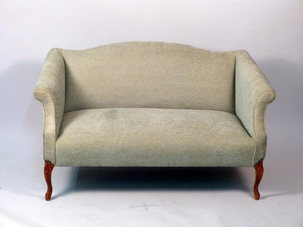 French Style Loveseat: With rounded arms, scalloped back, carved wooden legs, teal upholstery. 54" W X 29" D X 30" H . Upholstery in good condition