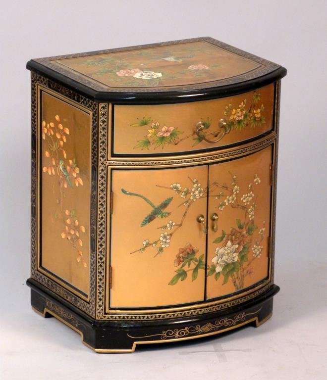 Chinese Gold Leaf Chest: Gilt and ebonized wood with painted decoration, 1 drawer over two drawers. 20" W X 16" D X 24" H.