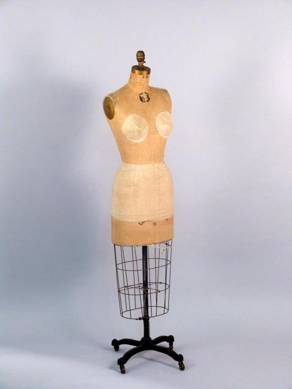 Vintage J. R. Bauman Normal Model Dress Form: Fabric covered, cast iron. 62" H.
