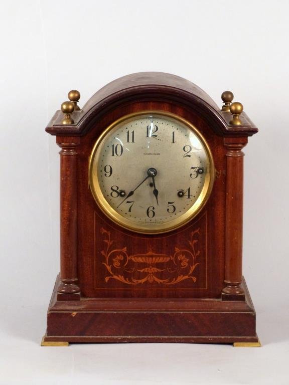 Seth Thomas Mantle Clock: Dome top, marquetry inlaid front. 11 3/4" W X 8 1/2" D X14" H.
