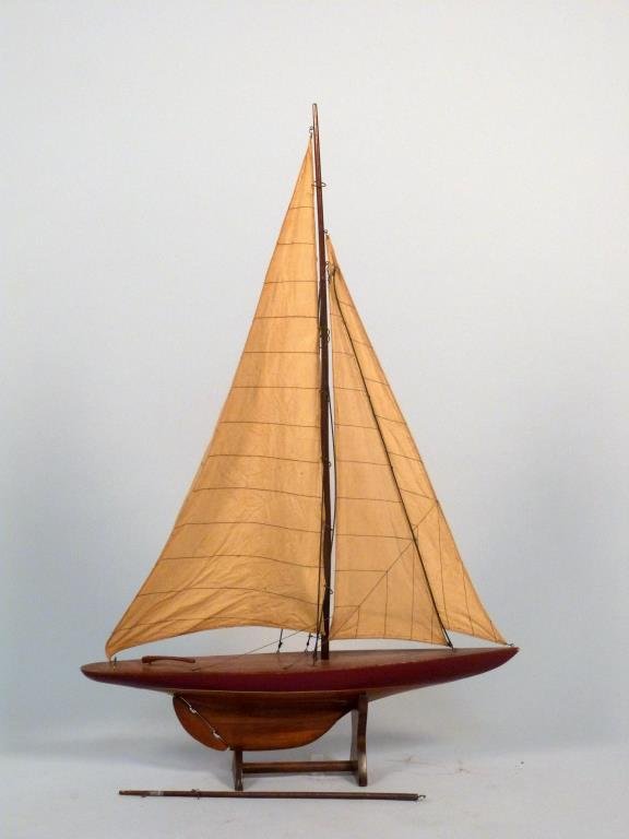 Model Sail Boat: Schooner, on stand, with harpoon and working rudder. 25 1/2" W X 27" H (including stand). Harpoon cracked.
