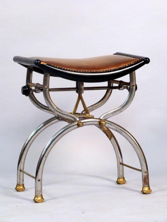 Mid-Century Mixed Metal Piano Bench: X frame, with adjustable height, studded leather on wood seat, marked: C. H. Hare & Son. 18" W X 12" D X 21. As is.