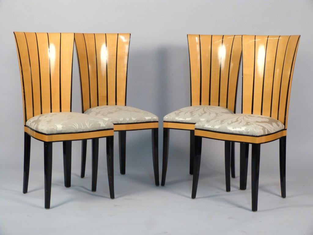 Set of 4 Art Deco Style Side Chairs: Blonde wood with ebonized trim, legs, and stripes on flared back, tapered and splayed legs, scalloped back. 17 1/2" W X 16 1/2" D X 37 1/2" H. Minor wear to finish.