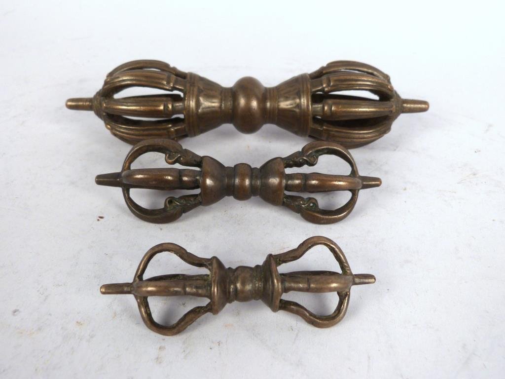 3 Tibetan Metal Vajra With Mythological Figures: 8 prong. (6 1/2" L), 4 prong (4" L), 4 prong (3" L).