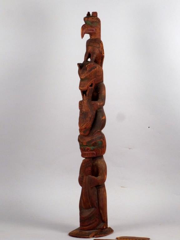 Northwest Coast Native American Totem Pole: Carved and polychromed wood, raven atop other mythological animal figures. 31" H. From a private NY collection. Base in 2 pieces, raven wings not attached.