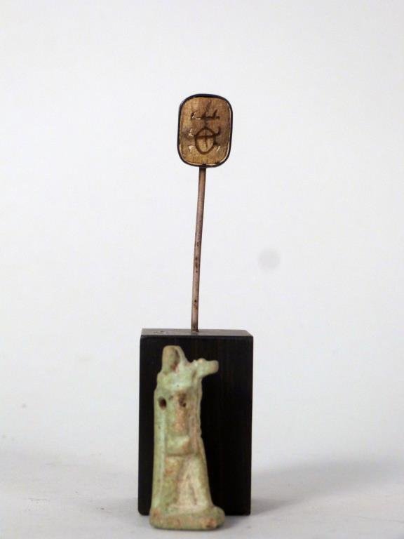 2 Antiquities: Egyptian faience amulet of Thoth (1 1/4" H), together with a mounted stone double sided seal (1/2" H; mount 3 1/2" H).