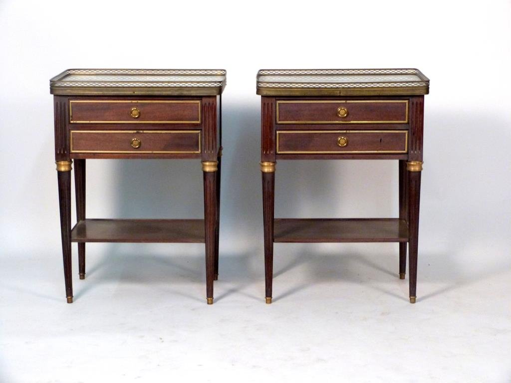 Pair of 2 Tier French End Commodes: Galleried marble tops, 2 drawers, fluted and tapered legs. 20 1/4" W X 14 1/4" D X 27 1/2" H. Some warping to legs.