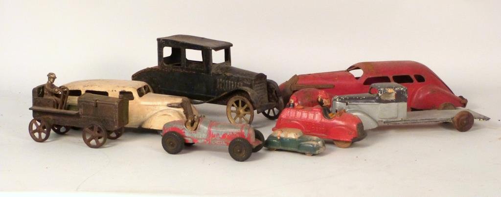 8 Assorted Vintage Toy Trucks & Cars: Including Hubley Kiddie Toy race car and Mickey Mouse fire truck.
