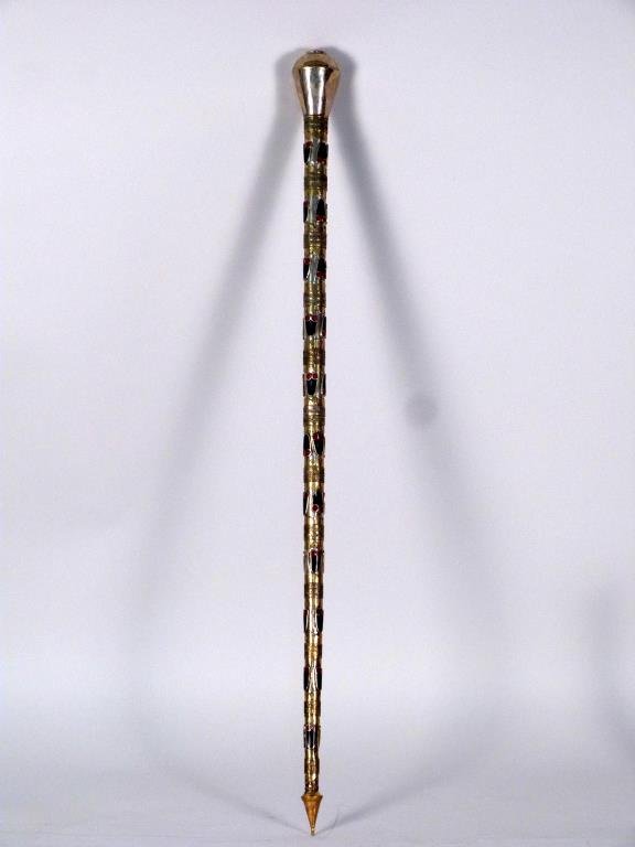 Middle Eastern Mixed Metal Cane: Silver and brass with enamel inlay and stone mounts, in two parts. 38" L. Dent to head of cane.