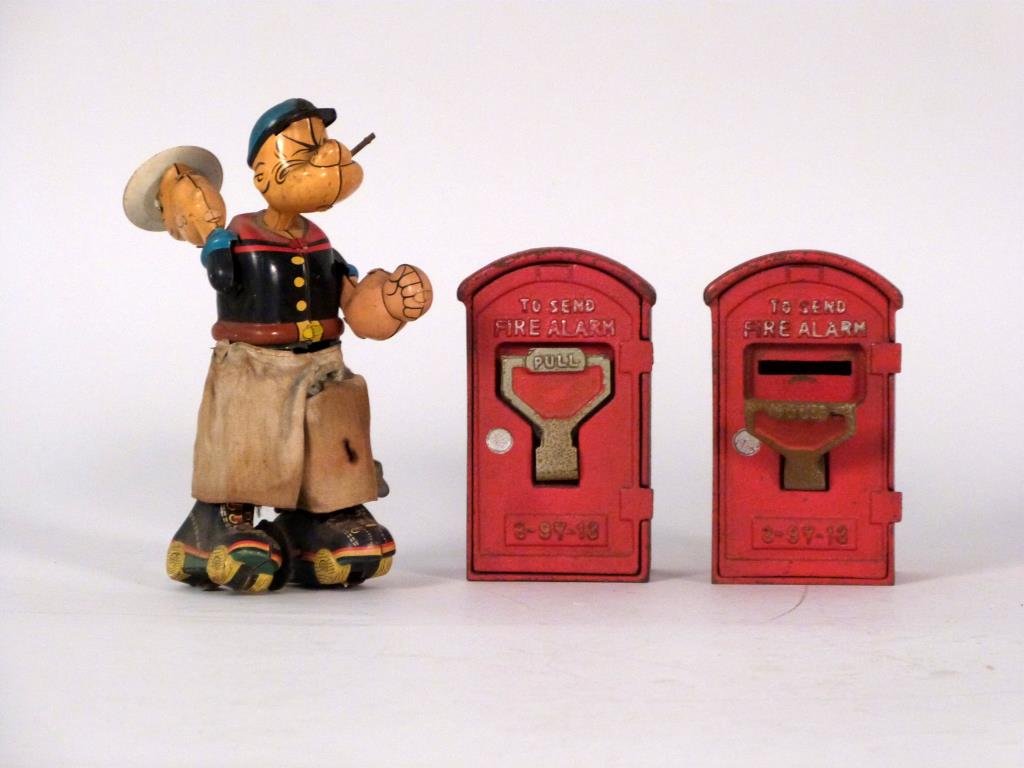 3 Vintage Toys: Roller skating Popeye and 2 fire alarm toy banks.