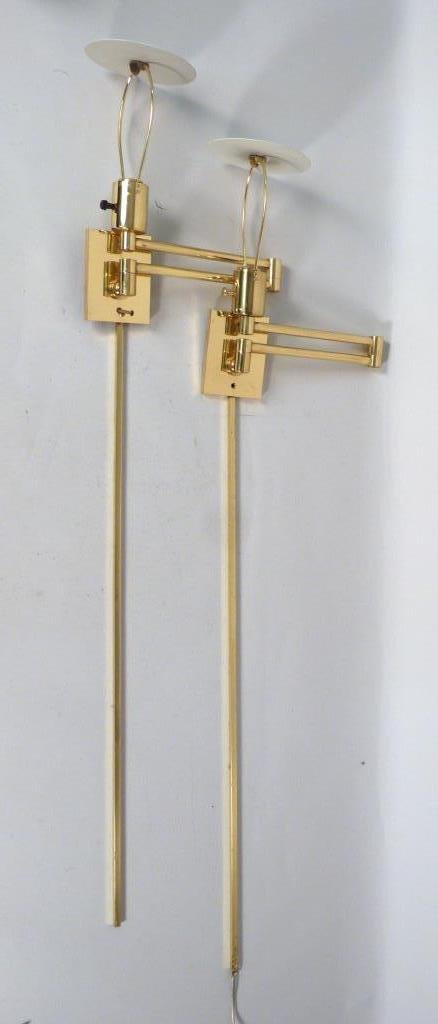 Pair Hansen Mid-Century Wall Fixtures: With swing arms, brass plated. 42 1/2" X 23" W (open). One knob replaced. (Property of a Lady)