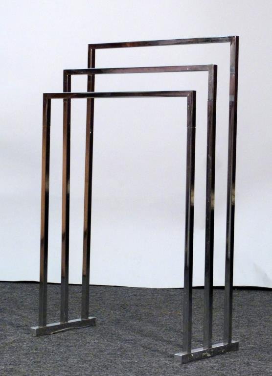 Chrome Towel Stand: 3 tiers. 22" W X 10 1/2" D X 35 1/2" H. Needs tightening. (From a Prince Street Apartment)