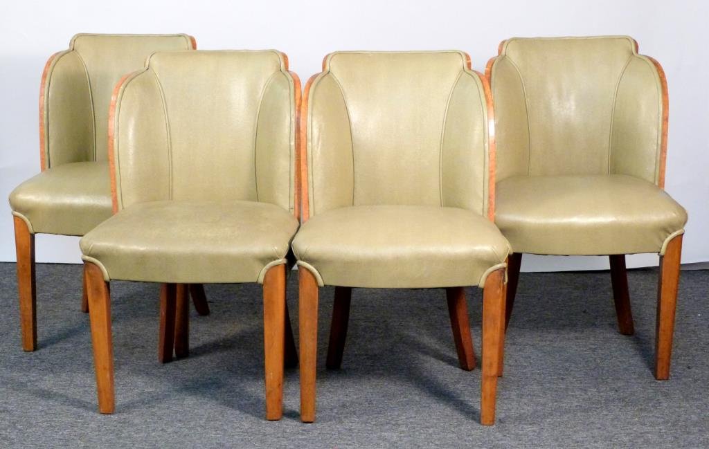 Set 4 Art Deco Dining Chairs: Sculpted burled wood frames with faux snake skin upholstery, think and thin piping, splayed rear legs. 21" W X 21" D X 35" H. Small loses to veneer. (From a Prince Street Apartment)