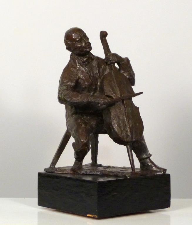 Signed Chaim Gross - Bronze: Cello player, signature inscribed, numbered 1/7, mounted on revolving base. 16 1/2" H (including attached 3" base) X 8" square. Some loss to veneer on base. (799 Park Avenue Property)