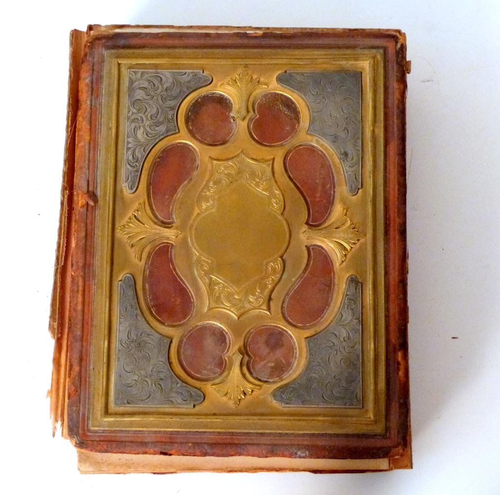 Vintage Photos & Album: Leather and mixed metal cover. Vintage photos, many hand colored. 11 1/2" H X 9" W. (From a Prince Street Apartment) <