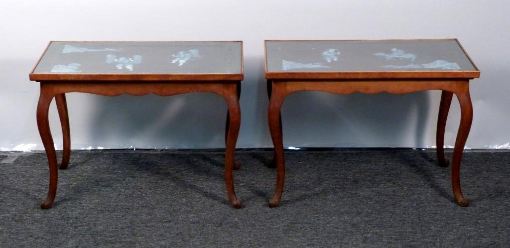Pair of Side Tables with Chinese Style Tiles: Sculpted wood frames with scroll feet, inset glass top over cut out tiles. 30" W X 17 1/2" D X 21" H.