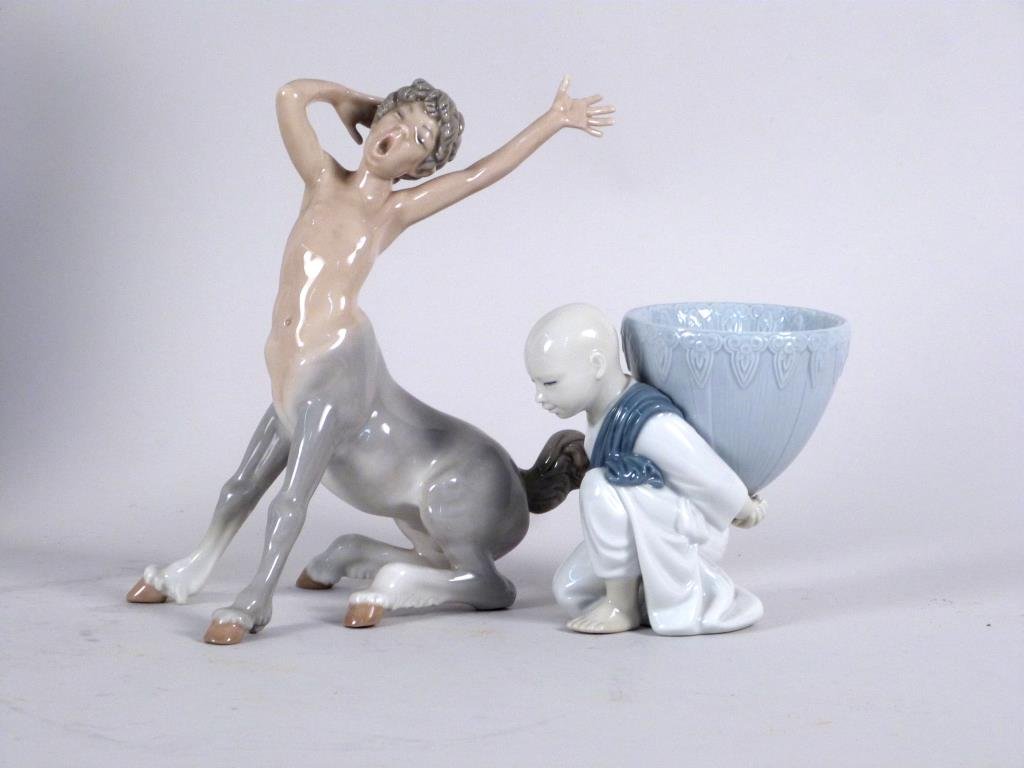 2 Lladro Porcelain Figures: Centaur and Chinese man. Taller: 8 /2" H. (377 Rector Place Estate)