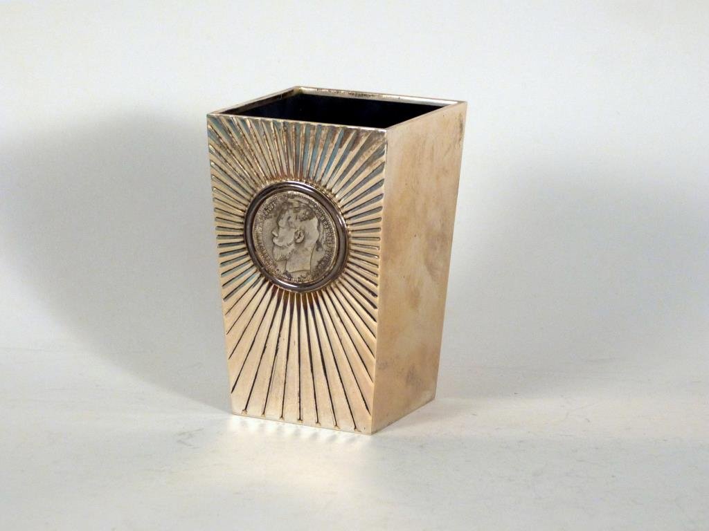 Marked Modern Faberge Sterling Beaker/Vase: Tapered square design with sunburst front surrounding mounted Russian Coin. Modern Faberge mark with 925% Sterling stamp. Felt lined. 9.5 troy oz. (377 Rector Place Estate)