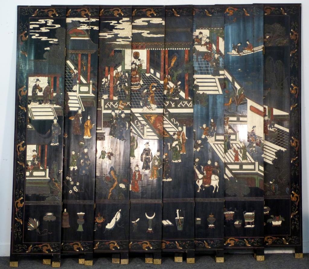 8 Panel Chinese Coromandel Screen: Black lacquer, with polychromed incised carvings of a village scene, and a landscape with birds and blooming flora. Each panel: 16" W X 84" H. As is.