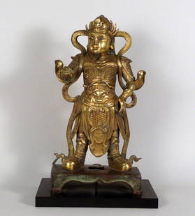 Asian Gilt Bronze Figure: Dressed in amour. 19" H (including 1" wood mount). (From an East Side Townhouse)