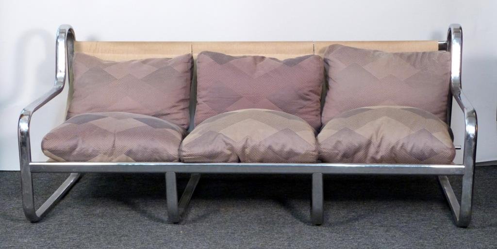 Mid-Century Chrome Sling Style Sofa: Knoll manner with canvas slings, held by leather straps, 6 loose cushions. 76" W X 31" D X 32" H. (From a Prince Street Apartment)