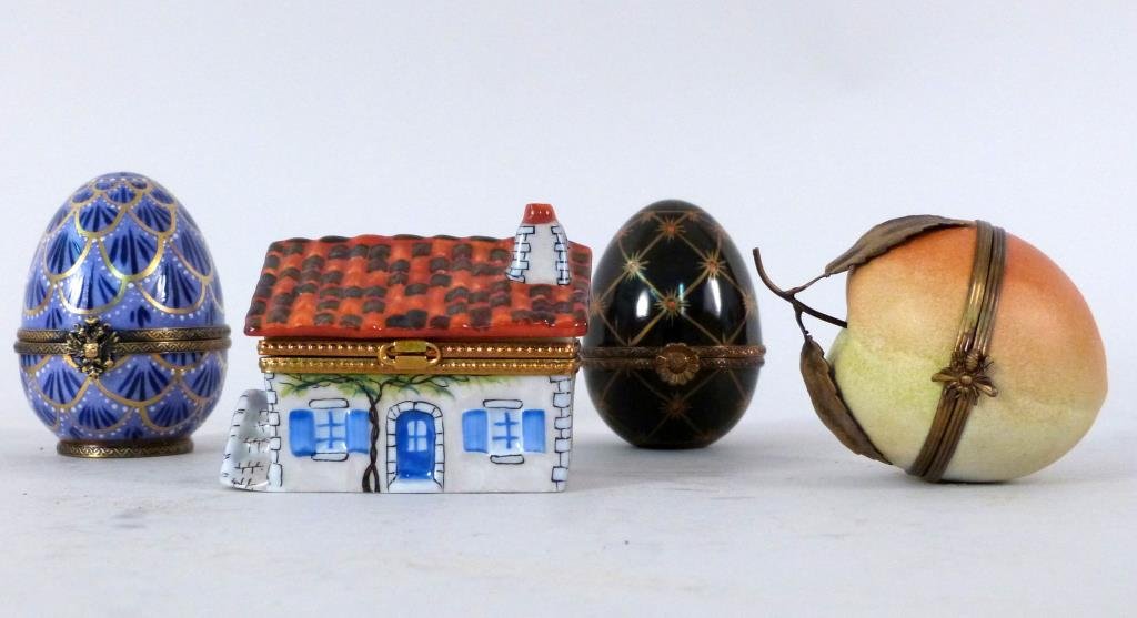 4 Hand Painted Porcelain Limoges Boxes: Comprising modern Faberge egg, and faberge style egg, house, and peach. Tallest: 2 3/4" H.