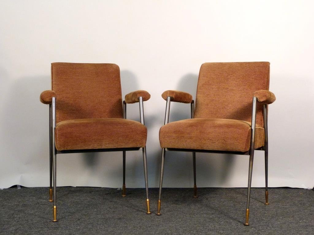 Pair of Upholstered Arm Chairs: Steel and brass frames, tan/brown upholstery with rolled and padded arm rests. 24" W X 24" D X 33" H. Some wear to frames. (From an East Side Townhouse)