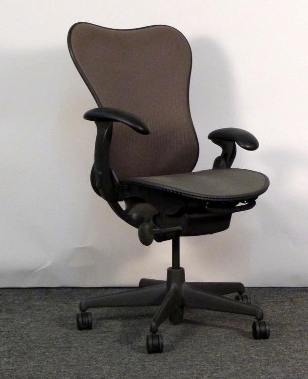 Herman Miller Aeron Chair: Brown/grey mesh back, green/grey. 28 1/2" W X 26" D. Minor abrasion to seat and back. (From an East Side Townhouse)