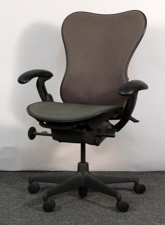 Herman Miller Aeron Chair: Brown/grey mesh back, green/grey. 28 1/2" W X 26" D. (From an East Side Townhouse)