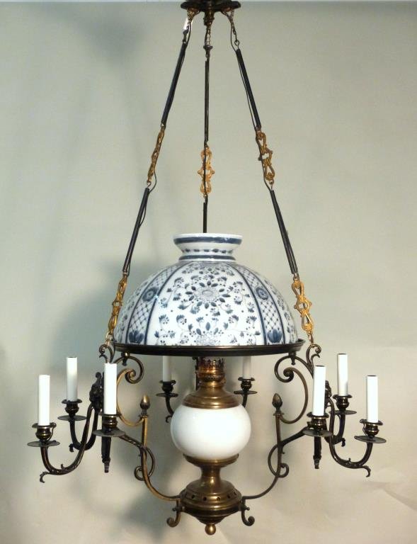 9 Light American Lamp Chandelier: Iron frame with lion heads, milk glass light and painted milk glass shade. 26 1/2" D X 45" H.