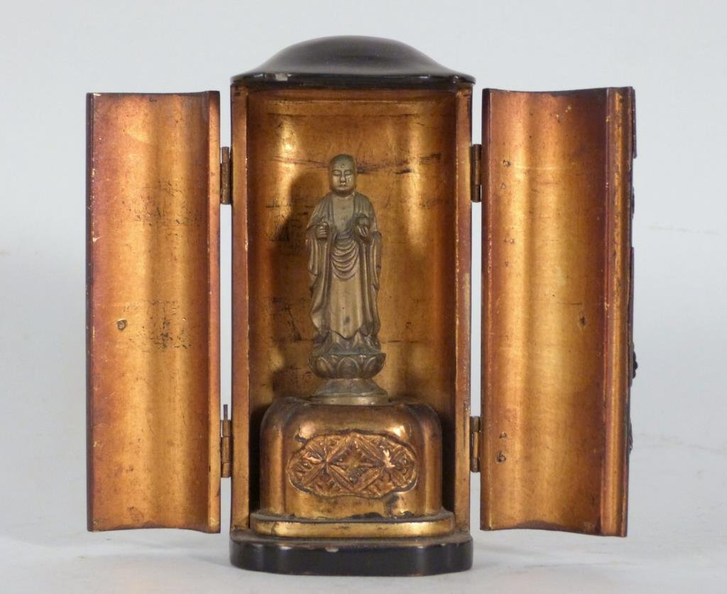 Japanese Lacquered Buddhist Traveling Shrine: Bronze standing Buddha in shrine with gold interior. 4" H.