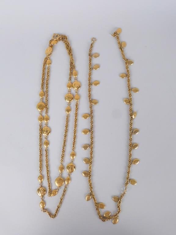 2 Chanel Gold Tone Costume Necklaces: 1 with logo and Coco portraits (72") and 1 with logo (40" L.)
