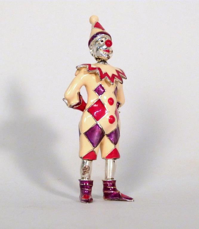 Tiffany & Co. Sterling & Enamel Circus Clown: Hands behind back. Designed by Gene Moore. Made in Italy for Tiffany & Co., New York, New York, circa 1990. Marks: TIFFANY & CO., STERLING 925. 3 1/2" H. (From a 45 Sutton Place South Former Jewelry D