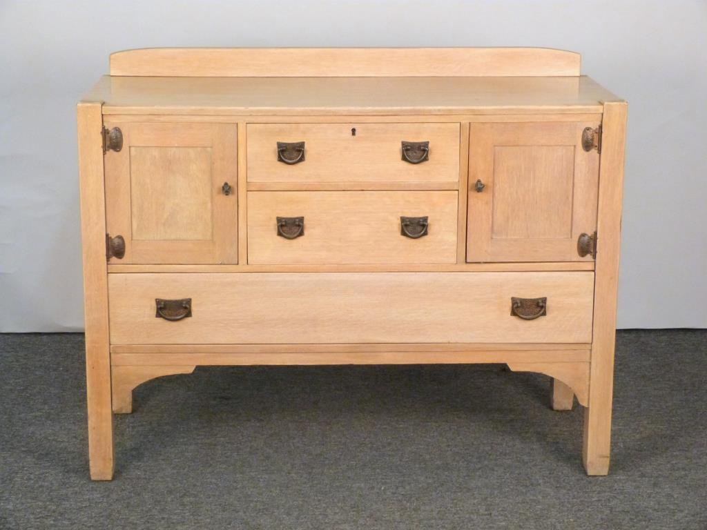 Stickley Style Cabinet (Attr Quaint Stickley Bros): Cerused oak, back splash, 4 drawers, 2 doors, decorative metal hinges and hardware. 50" W X 21" D X 39" H. (From a Long Island Estate - Same as the Quaint Stickley Brothers Dining Set)