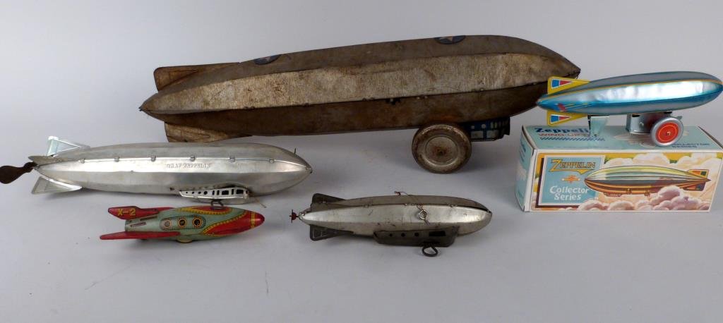 5 Vintage Zeppelin Toys: Aluminum, tin, and litho tin. 27" L X 6 1/2" D X 8" H. (925 Park Ave Estate)