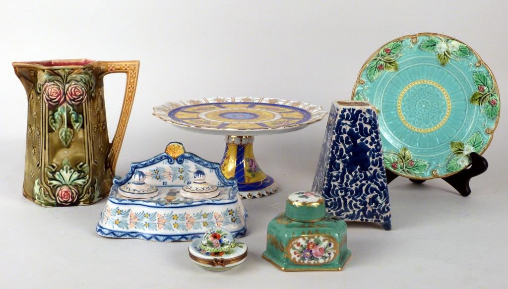 7 French Porcelain & Ceramic Articles: Including Frie Onnaic pitcher (7 1/2" H), Sevres cake plate (10" D) and ink well, Quimper ink standard, Sarreguemines plate, Limoges covered box, and unmarked tapered vase (as is). (Prospect Park Broo