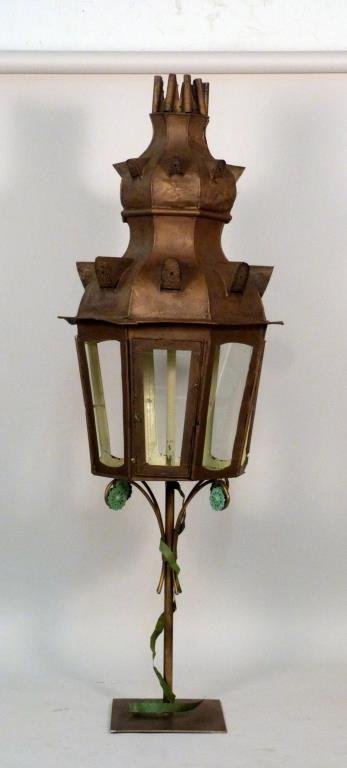 Large Gilt Metal Standing Lantern: Arabesque crown, glass cage, on metal post with verdigris floral and ribbon appointments. 67" H X 24" D. 3 panes of glass missing.